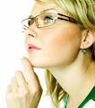 A young woman looking thoughtful